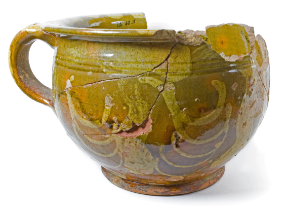 An 18th-century chamber pot decorated with Parker Pottery's "bars and swags" design