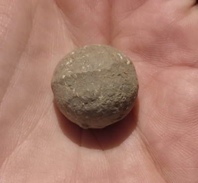 Photograph of a British Caliber Musket Ball with Compression Banding.