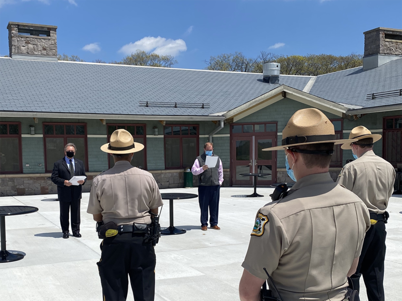 Presenting the new recruits with their certificates
