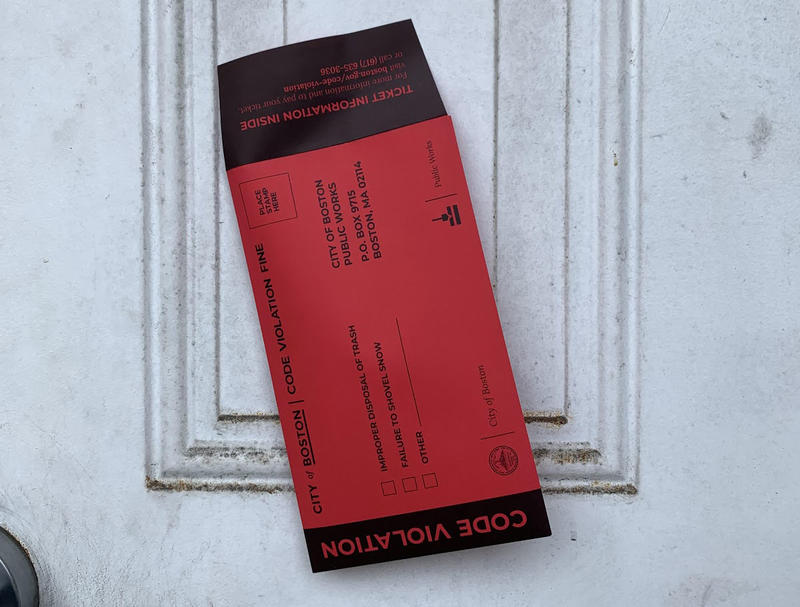 The new envelope design on a door.