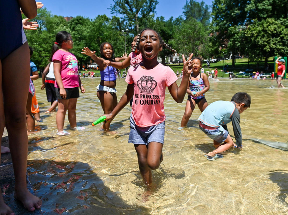 pink tee child frog pond opening