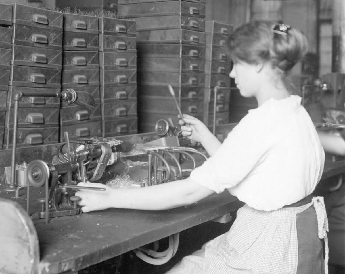 	 Incandescent Lamp Manufacturing, Operating Hand Flaring Machine, circa 1915