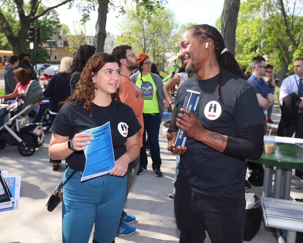 311 Director & Staff Member at Community Event 