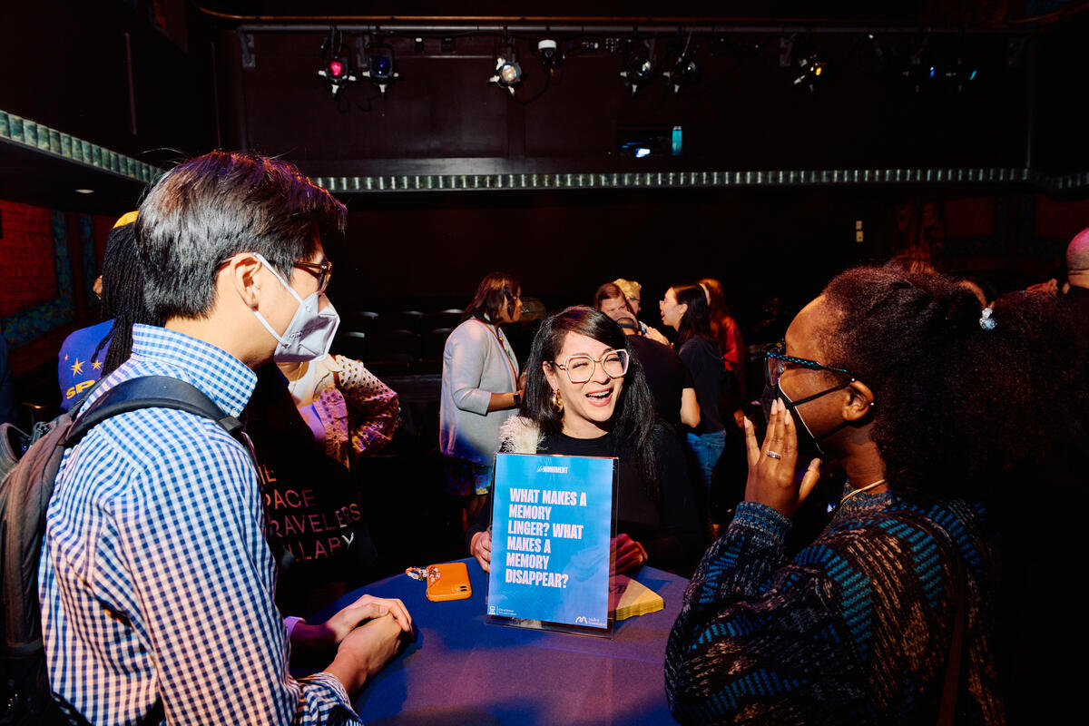 Attendees at "Black Lives, Black Stories, Our History: The African Diaspora and New England" converse at the reception