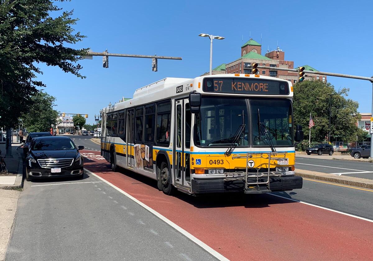 MBTA Route 57 bus in red-painted bus lane on Brighton Ave 