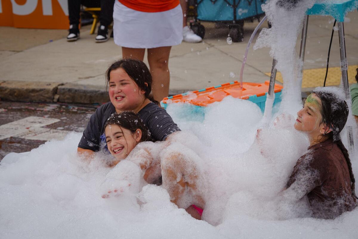 Folks at an Open Streets Boston Hyde Park event.
