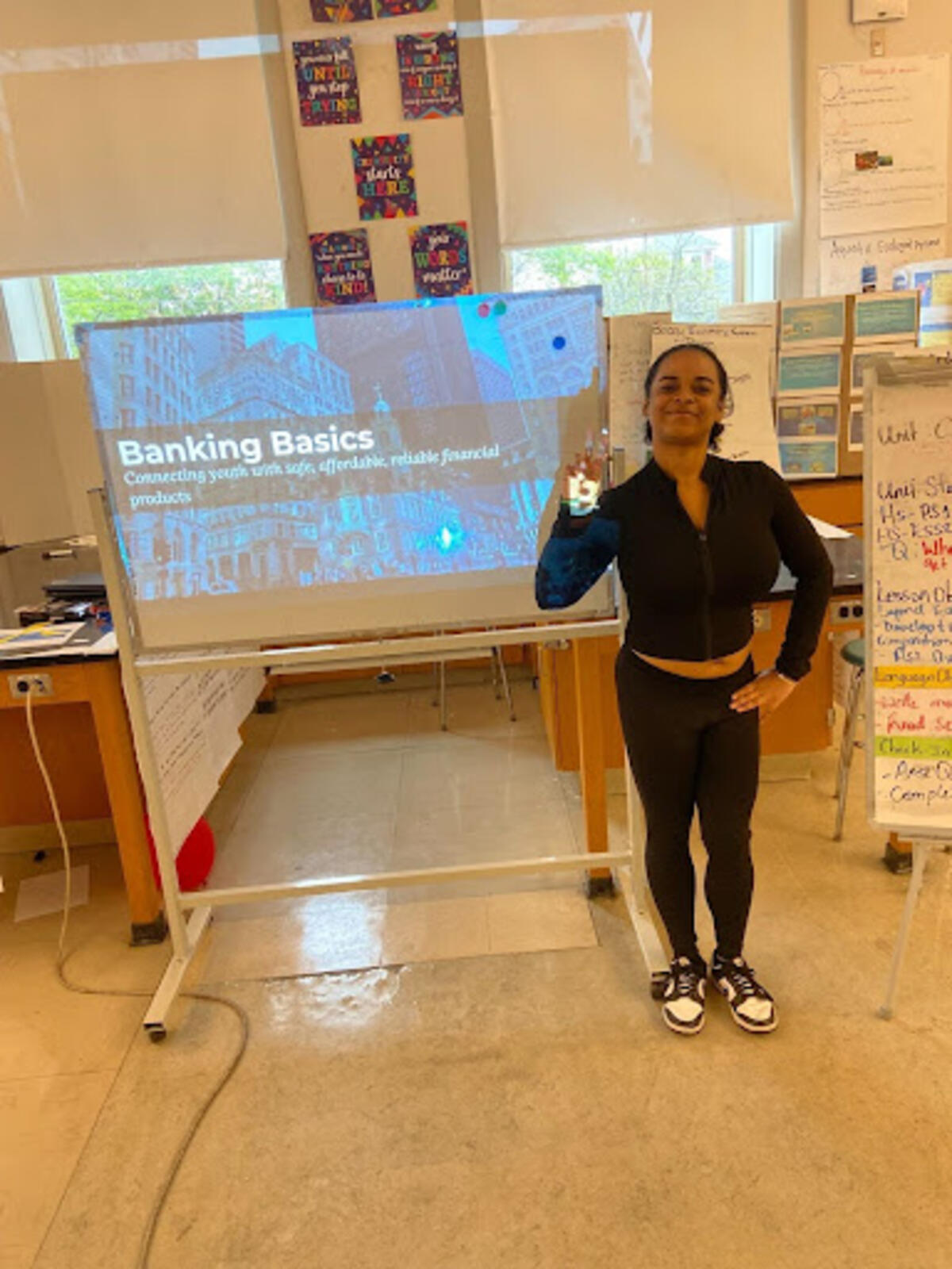 Mentor Melasia presenting the Basics of Banking workshop to her AP Chemistry class at Excel High School