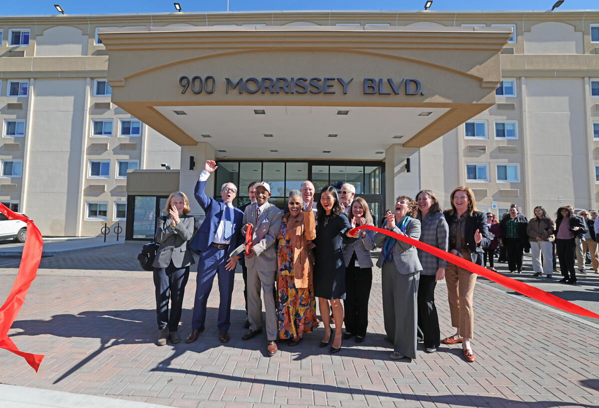 Mayor Wu, The Community Builders, and Pine Street Inn celebrate the ribbon cutting at 900 Morrissey Blvd.