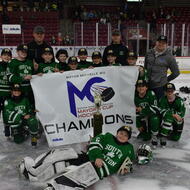 Mayor's Cup Ice Hockey pose with championship banner