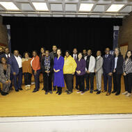 Mayor Wu, City leaders, and community partners come together for a photo onstage at Boys and Girls Club of Boston in Roxbury.