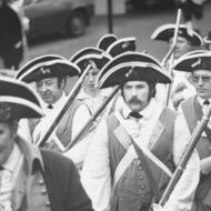 Individuals dressed as soldiers during the 1976 Evacuation Day celebration