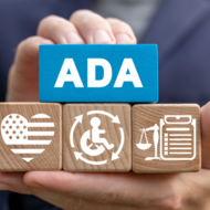 Hands holding ADA building blocks
