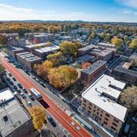 Center-running red painted bus lanes on Columbus Avenue from an arial view