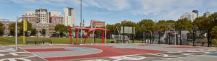 A wide-angle image of the Madison Park Basketball Courts with new public art projects